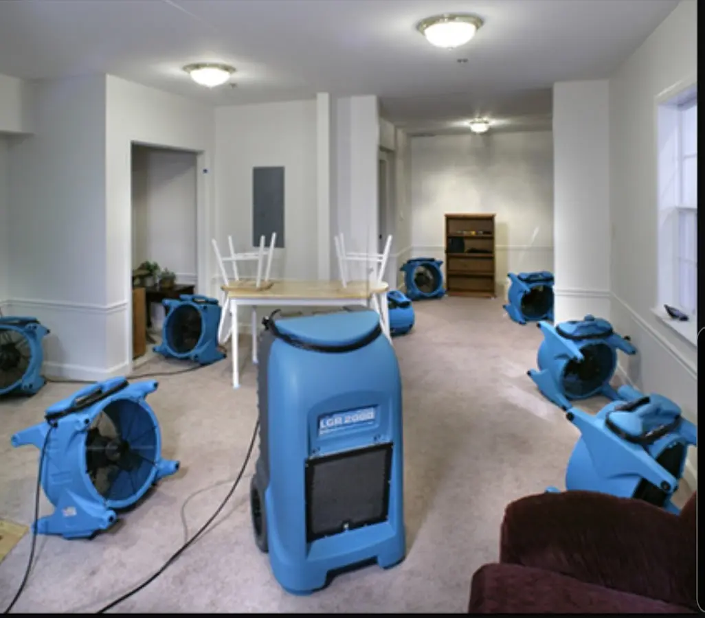 Air movers and dehumidifier setup for Water Extraction & Removal in Sanger